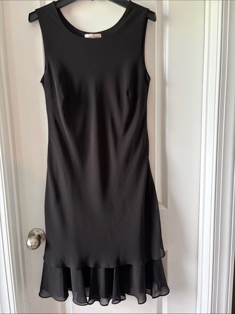 Sleeveless Black Midi Dress with Flared Ruffle Hem